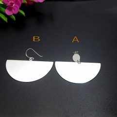 A pair of handcrafted 925 sterling silver half circle fan dangle earrings featuring a high-polished, smooth surface and geometric statement design.