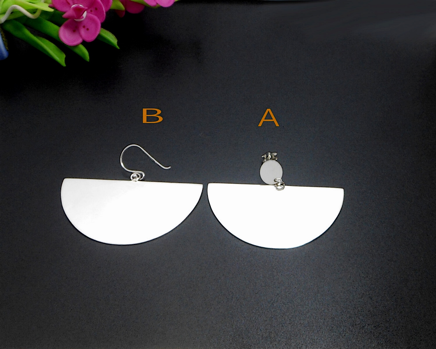 A pair of handcrafted 925 sterling silver half circle fan dangle earrings featuring a high-polished, smooth surface and geometric statement design.