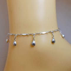 925 Sterling Silver scallop shell charm anklet on a wrist