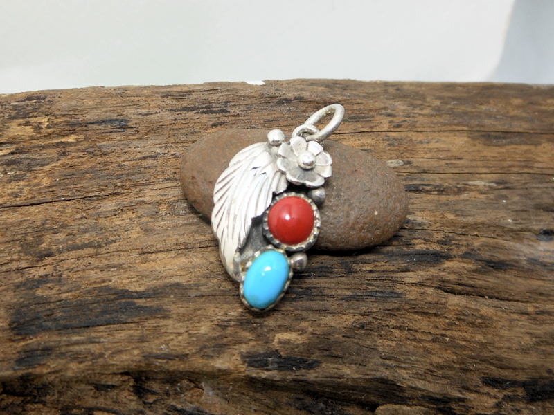 Detailed view of right-facing sterling silver flower leaf design, SKU PT24