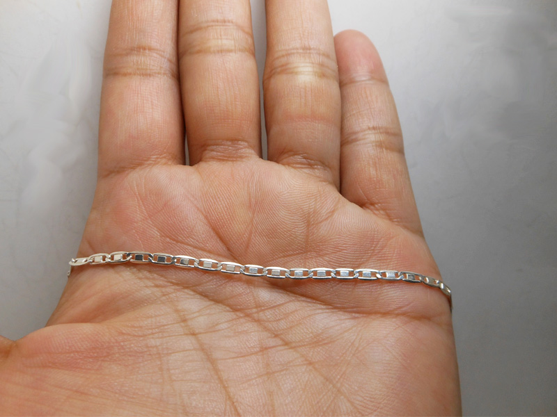Handheld view of a 925 sterling silver Valentino chain anklet, SKU AS43
