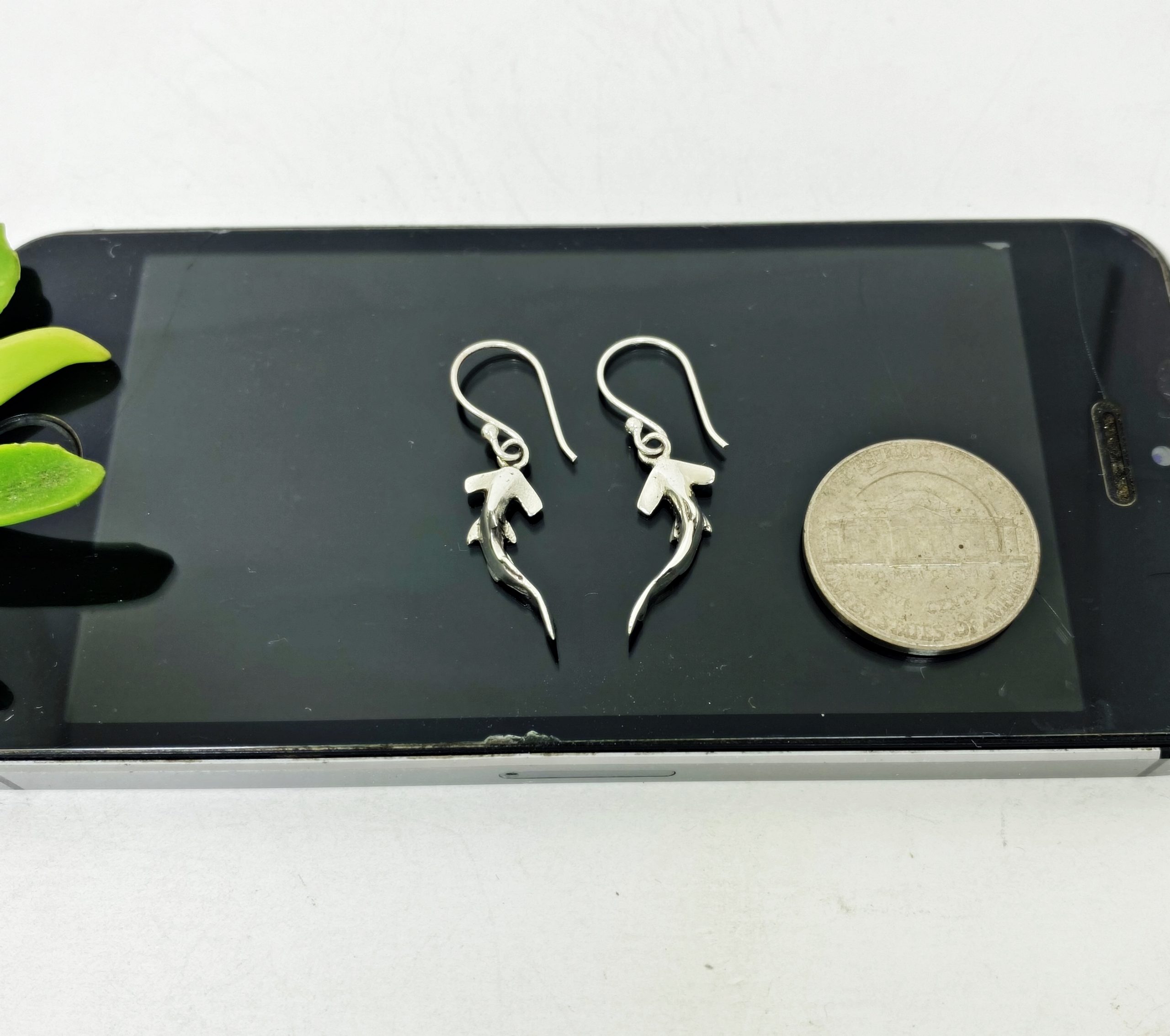 Hammerhead shark silver earrings size comparison next to a coin