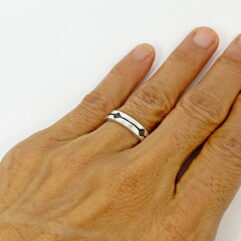 Lifestyle shot of R023 Horizon silver ring worn by a woman model, handcrafted from 925 sterling silver by Sup Silver.