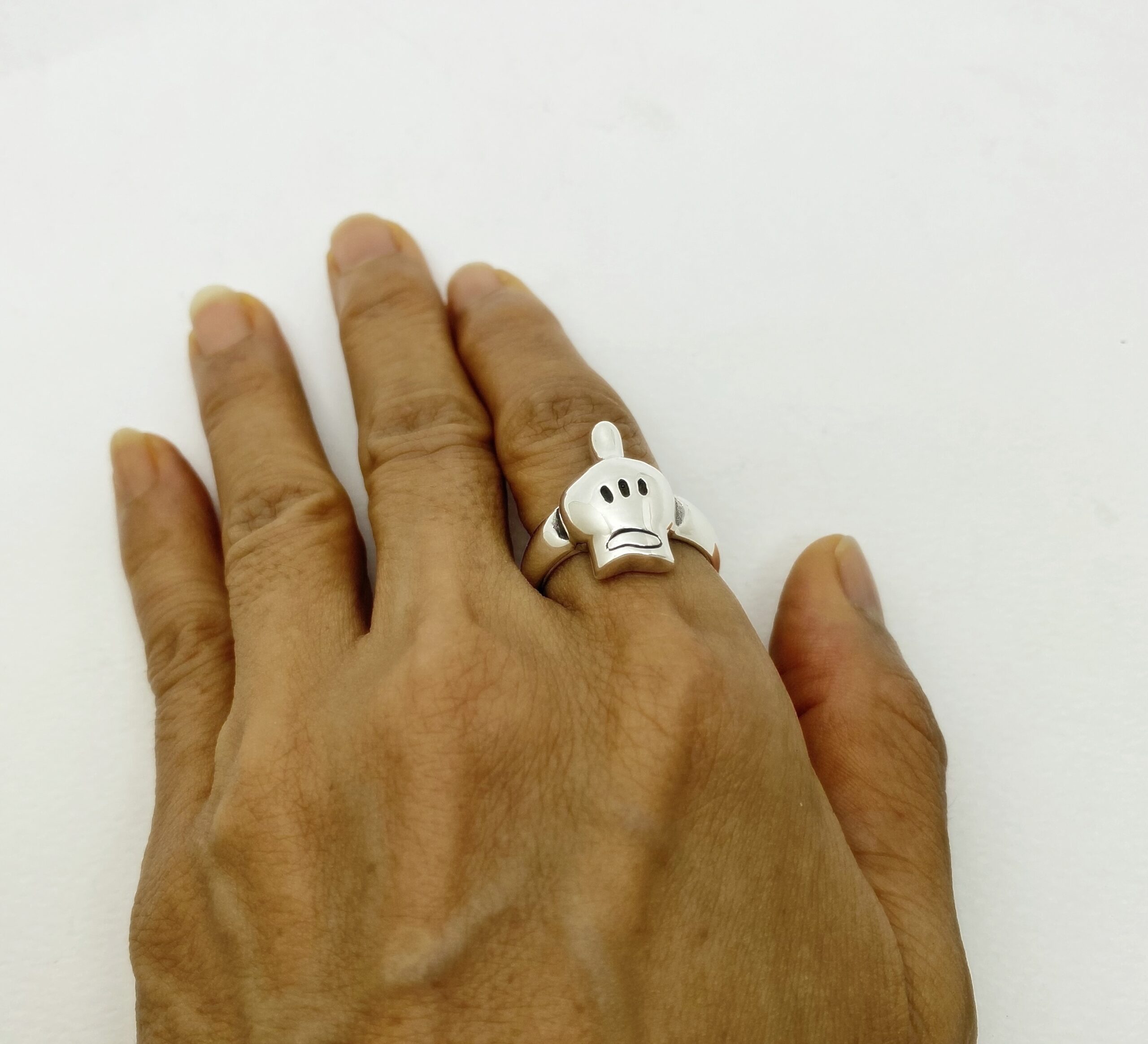 r308b-cartoon-hand-skull-ring-handcrafted-925-silver Left side view of r308 cartoon hand skull ring, handcrafted from 925 sterling silver by Sup Silver.