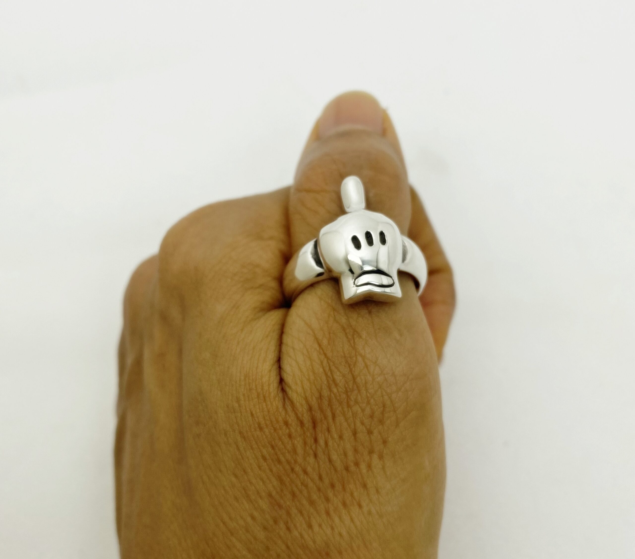 r308d-cartoon-hand-skull-ring-handcrafted-925-silver Top Left side view of r308 cartoon hand skull ring, handcrafted from 925 sterling silver by Sup Silver.
