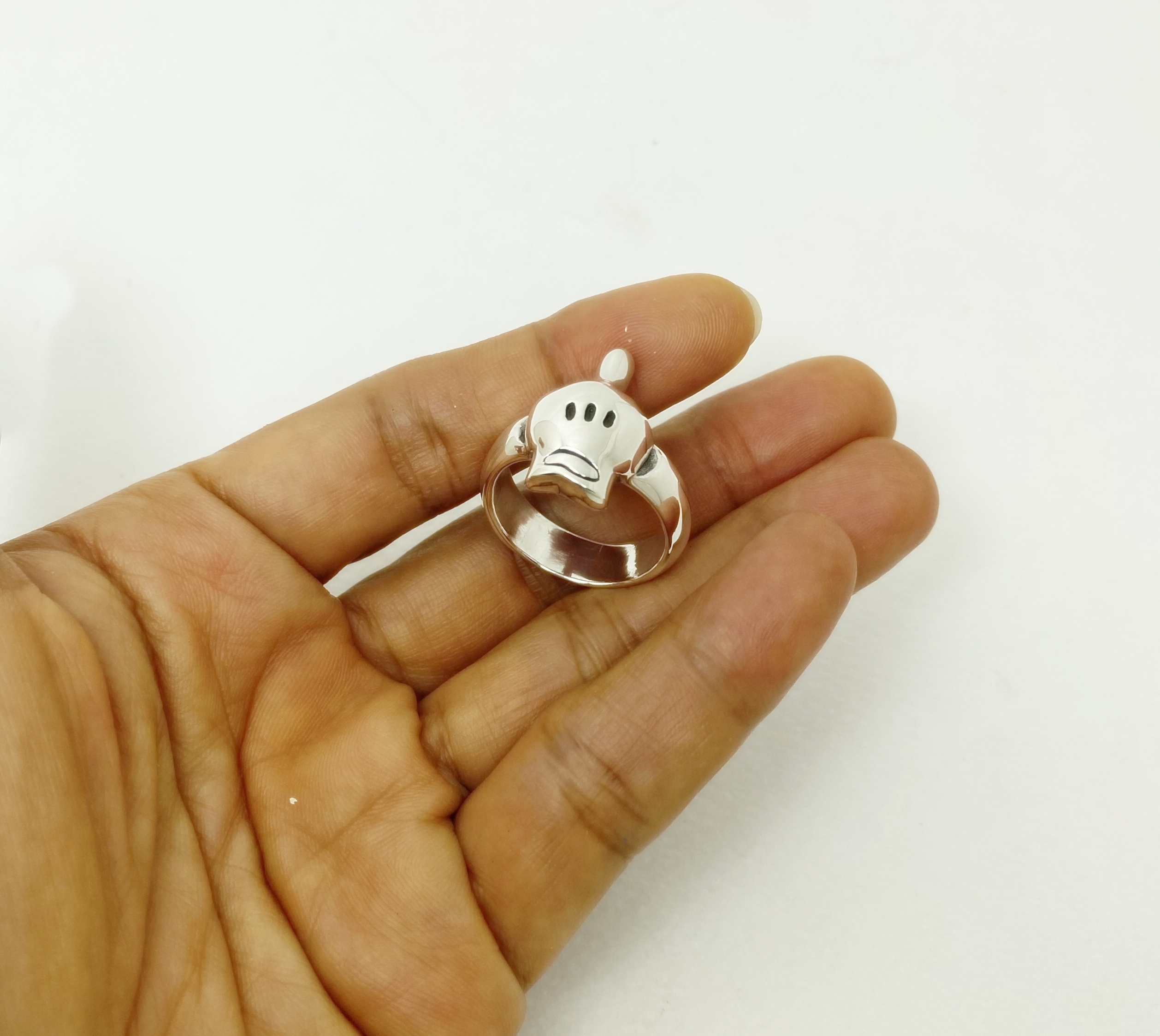 r308e-cartoon-hand-skull-ring-handcrafted-925-silver Front side view of r308 cartoon hand skull ring, handcrafted from 925 sterling silver by Sup Silver.