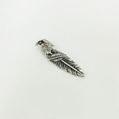 A detailed shot of the 925 sterling silver movable eagle feather pendant showcasing its intricate textures.
