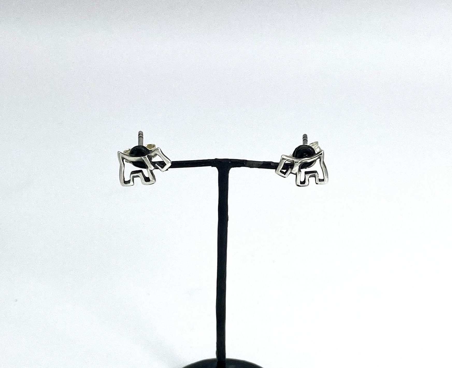 925 sterling silver minimalist scottie dog jewelry on black T-bar display stand