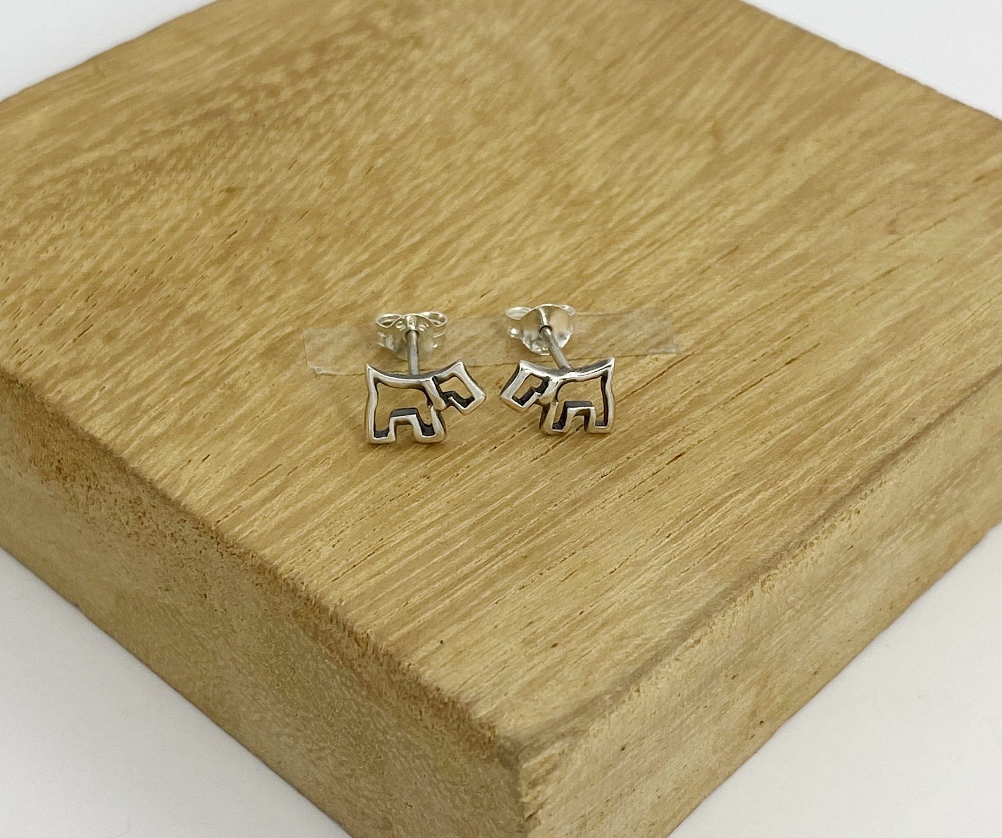 925 sterling silver scottish terrier dog stud earrings on wooden display block sup silver